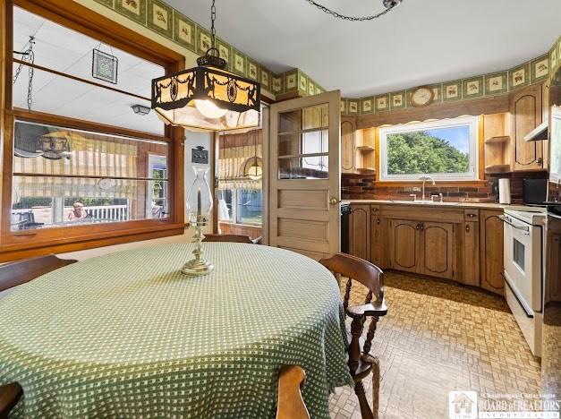 5005 W Main Rd, Pomfret, NY 14063 - dining space with healthy amount of natural light