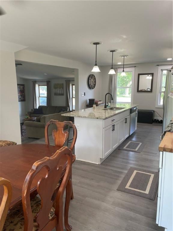 16562 Ridge Rd, Murray, NY 14470 - dining area with healthy amount of natural light and wood finished floors