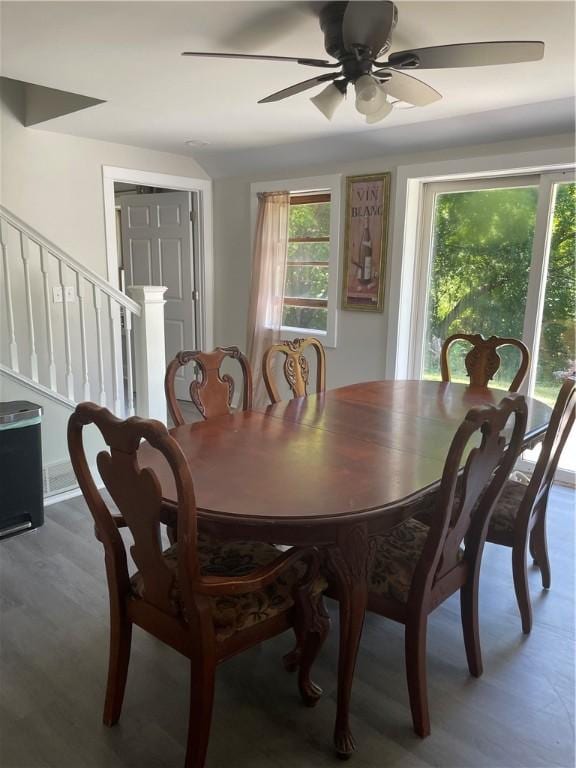 16562 Ridge Rd, Murray, NY 14470 - dining area featuring ceiling fan, stairs, and wood finished floors