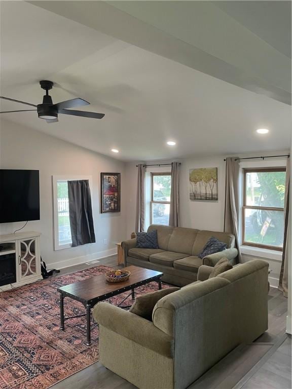 16562 Ridge Rd, Murray, NY 14470 - living room featuring healthy amount of natural light, a ceiling fan, vaulted ceiling, recessed lighting, and light wood finished floors