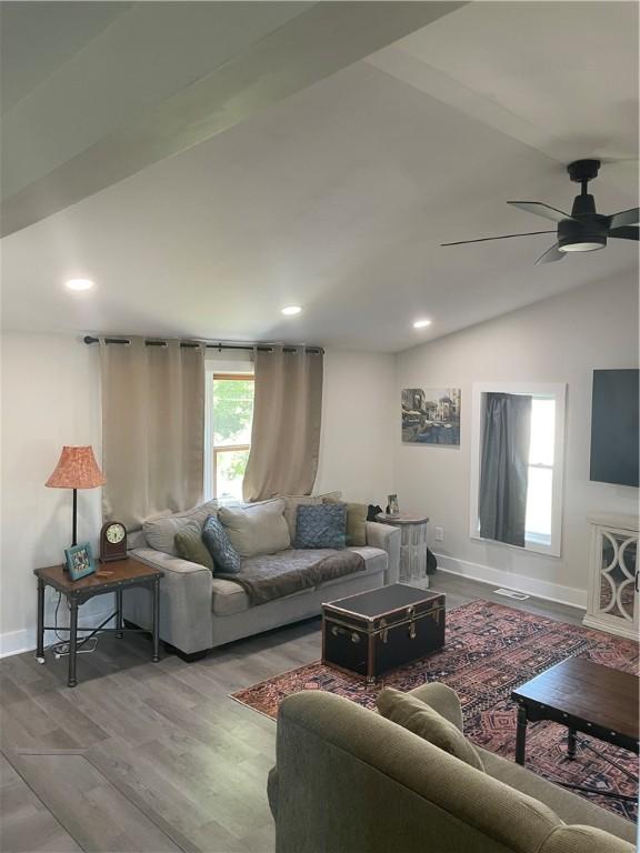 16562 Ridge Rd, Murray, NY 14470 - living area featuring wood finished floors, vaulted ceiling, a ceiling fan, and recessed lighting