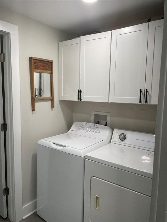 16562 Ridge Rd, Murray, NY 14470 - washroom featuring cabinet space and separate washer and dryer