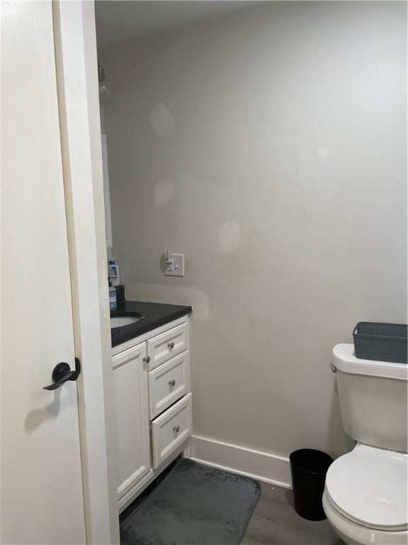 16562 Ridge Rd, Murray, NY 14470 - bathroom featuring vanity and wood finished floors