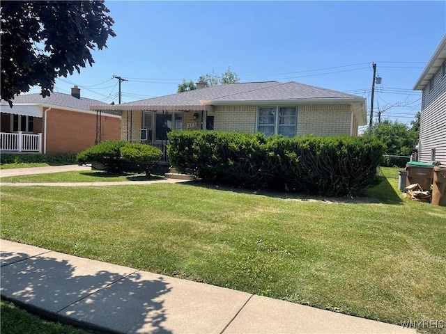 275 Nagel Dr, Cheektowaga, NY 14225 - ranch-style home featuring brick siding and a front yard