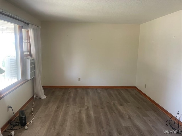 275 Nagel Dr, Cheektowaga, NY 14225 - spare room with wood finished floors and baseboards