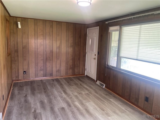275 Nagel Dr, Cheektowaga, NY 14225 - foyer with wood walls and wood finished floors