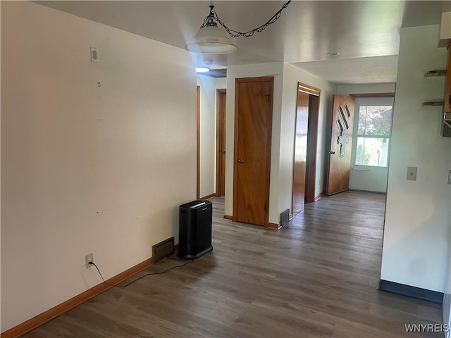 275 Nagel Dr, Cheektowaga, NY 14225 - unfurnished dining area with baseboards and wood finished floors