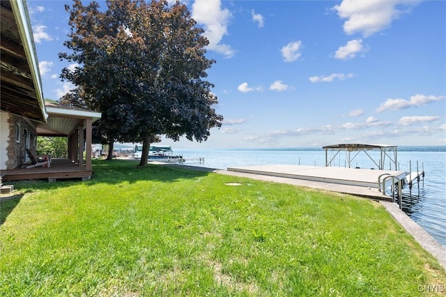 1659 Honoco Rd, Ledyard, NY 13026 - view of grassy yard with a dock and a water view
