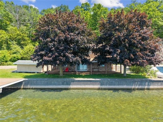 1659 Honoco Rd, Ledyard, NY 13026 - rear view of house with a yard