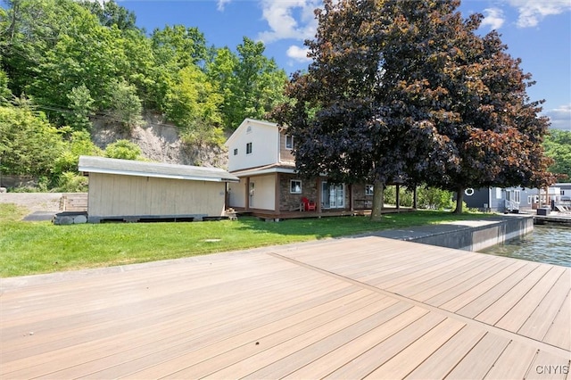 1659 Honoco Rd, Ledyard, NY 13026 - wooden deck featuring a yard and a water view