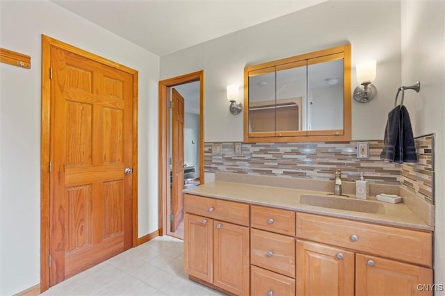 1659 Honoco Rd, Ledyard, NY 13026 - bathroom featuring decorative backsplash, vanity, and tile patterned floors