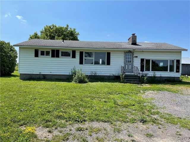 17106 State Route 3, Hounsfield, NY 13601 - view of front of home featuring a chimney and a front yard