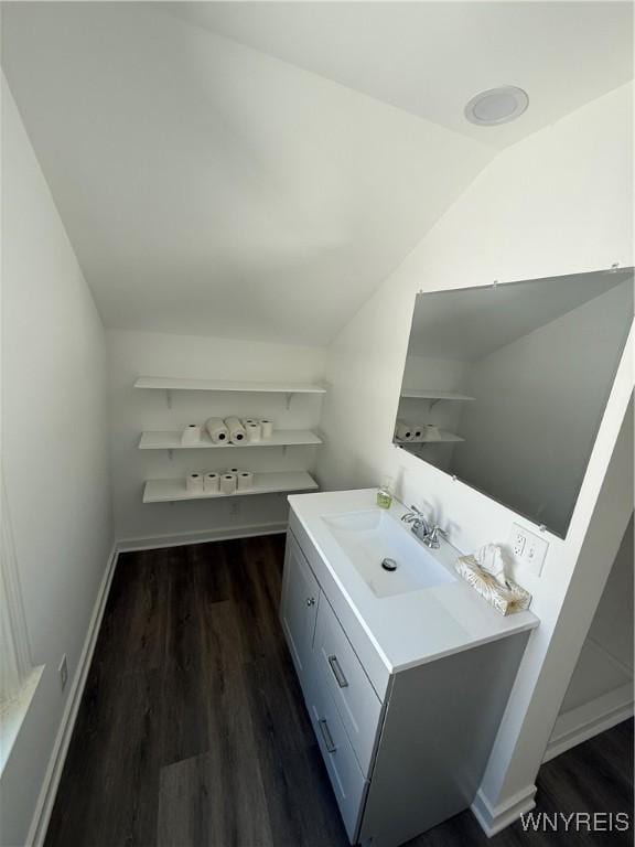 2656 Oakwood Ave, Hamburg, NY 14075 - bathroom featuring wood finished floors, vaulted ceiling, and vanity
