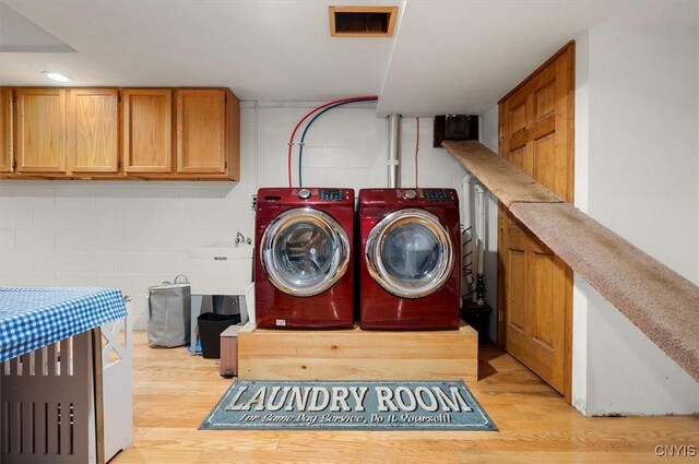 4970 State Route 8, Ohio, NY 13324 - laundry room featuring cabinet space, washer and dryer, light wood-style floors, and recessed lighting