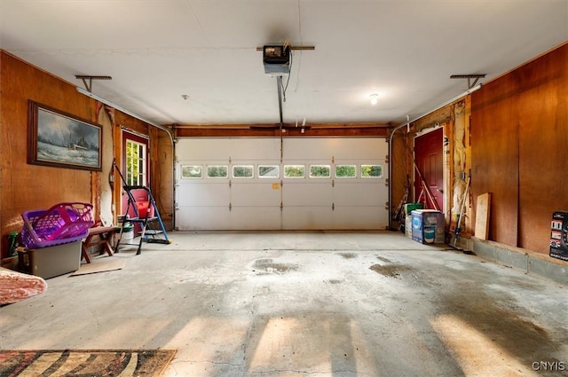 4970 State Route 8, Ohio, NY 13324 - garage featuring a garage door opener and wood walls