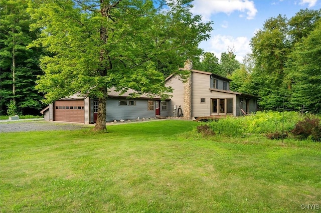 4970 State Route 8, Ohio, NY 13324 - rear view of house featuring a yard, a chimney, and a garage
