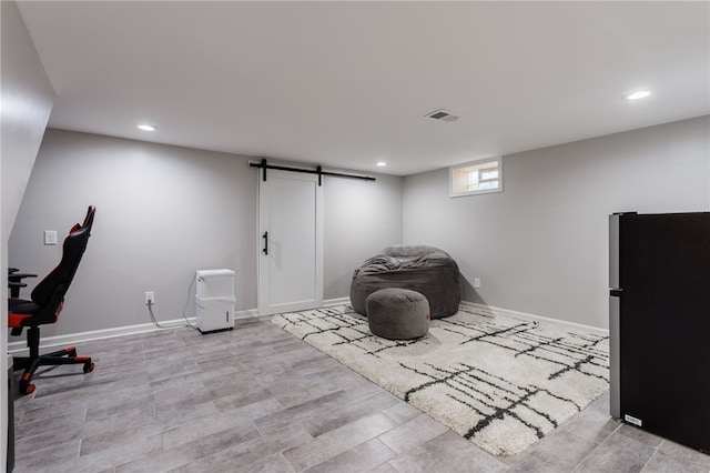 304 Simpson Rd, Irondequoit, NY 14617 - exercise area with a barn door and recessed lighting
