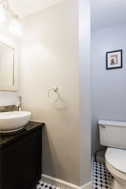 304 Simpson Rd, Irondequoit, NY 14617 - half bathroom featuring vanity and toilet