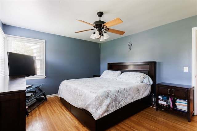 304 Simpson Rd, Irondequoit, NY 14617 - bedroom with wood finished floors and a ceiling fan