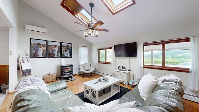 9447 County Route 75, Pulteney, NY 14418 - living area with a wood stove, a wall unit AC, a skylight, light wood-style flooring, and ceiling fan