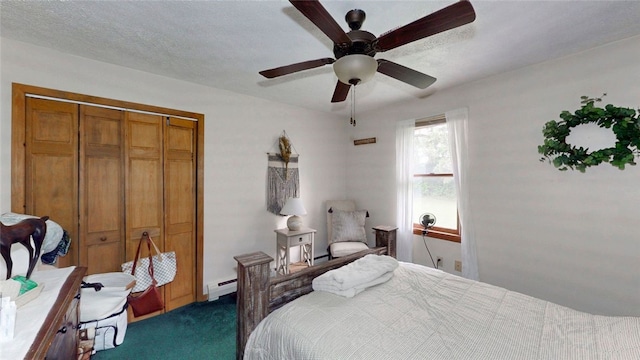 9447 County Route 75, Pulteney, NY 14418 - bedroom featuring a baseboard radiator, dark carpet, a ceiling fan, and a closet