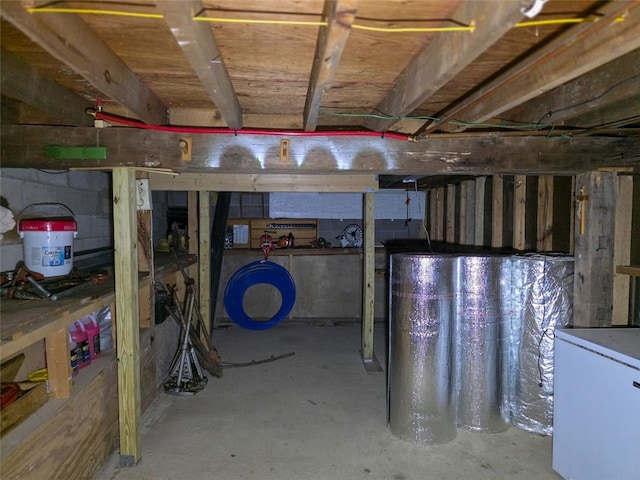 9447 County Route 75, Pulteney, NY 14418 - unfinished below grade area with refrigerator