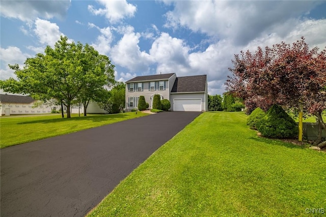 110 Clark Cir, Lenox, NY 13032 - colonial-style house with driveway, a front lawn, and an attached garage