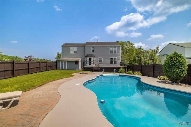 110 Clark Cir, Lenox, NY 13032 - view of pool with a wooden deck, a fenced backyard, an outbuilding, and a patio area