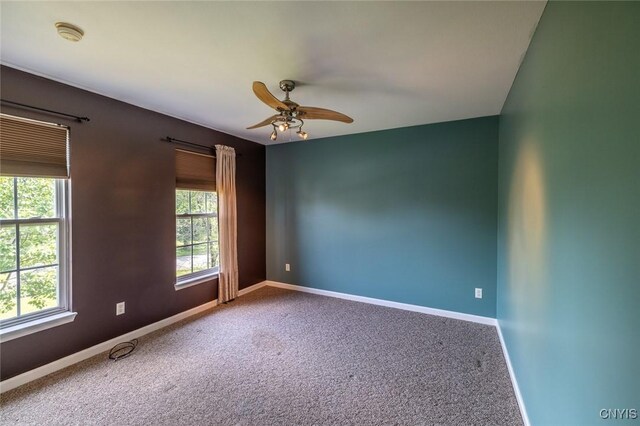 110 Clark Cir, Lenox, NY 13032 - carpeted spare room featuring plenty of natural light, ceiling fan, and a smoke detector