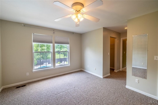 110 Clark Cir, Lenox, NY 13032 - carpeted spare room with ceiling fan and baseboards