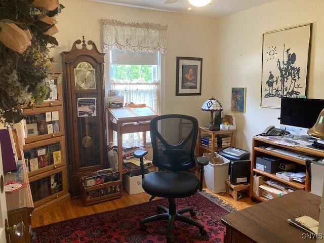 820 James St, Utica, NY 13501 - office area featuring wood finished floors and a ceiling fan