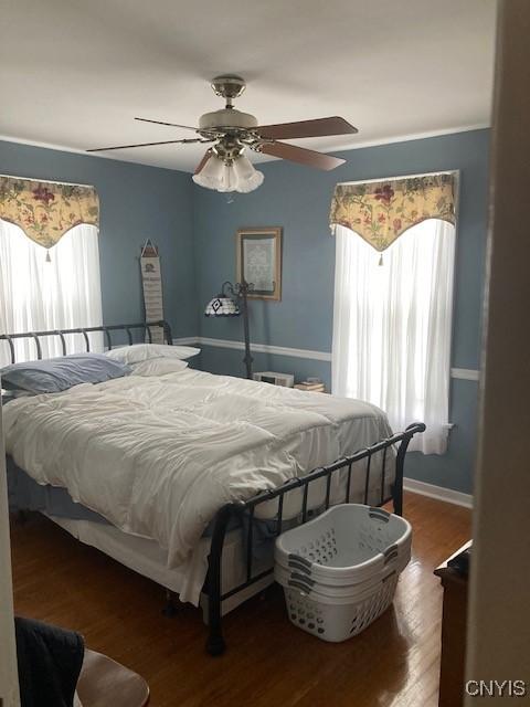 820 James St, Utica, NY 13501 - bedroom featuring wood finished floors and ceiling fan