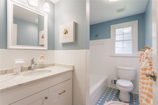 7 Chipping Rdg, Perinton, NY 14450 - full bath with tile walls, vanity, a tub to relax in, a wainscoted wall, and tile patterned floors