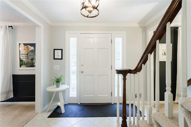 7 Chipping Rdg, Perinton, NY 14450 - carpeted foyer entrance with stairway, crown molding, tile patterned floors, and a chandelier