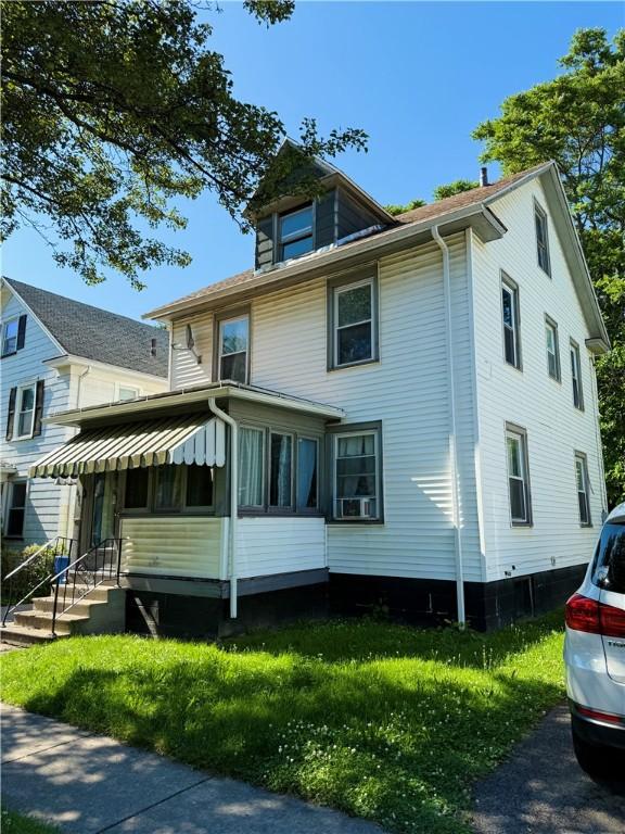 256 Durnan St, Rochester, NY 14621 - view of front of home with a front yard