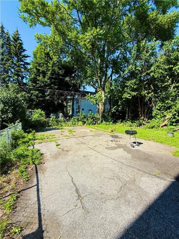256 Durnan St, Rochester, NY 14621 - view of yard with a patio area