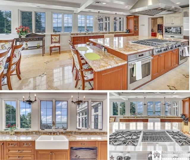 10 Elm Ln, Chautauqua, NY 14722 - kitchen with stainless steel appliances, island exhaust hood, healthy amount of natural light, light stone countertops, and recessed lighting
