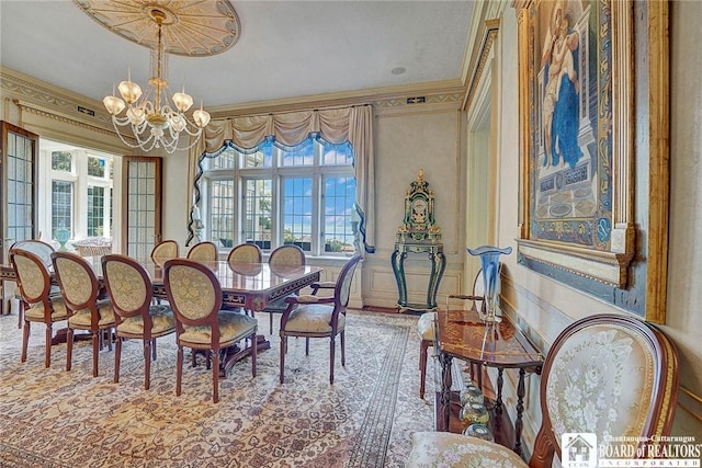 10 Elm Ln, Chautauqua, NY 14722 - dining room with a chandelier and crown molding