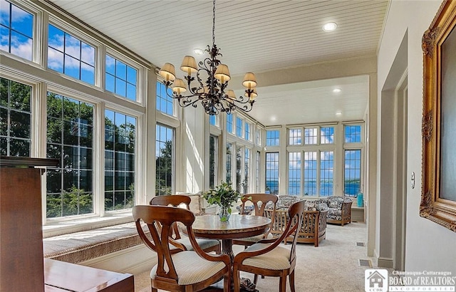 10 Elm Ln, Chautauqua, NY 14722 - sunroom featuring a chandelier
