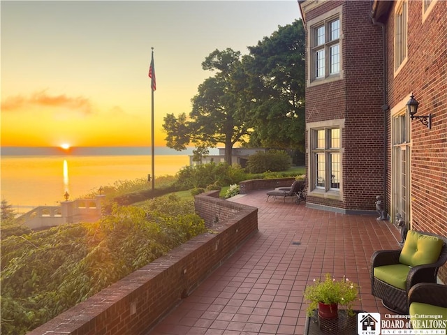 10 Elm Ln, Chautauqua, NY 14722 - view of patio / terrace with a water view