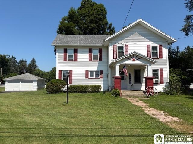 1683 Haskell Rd, Portville, NY 14760 - view of front of property featuring a detached garage, a front lawn, and an outdoor structure