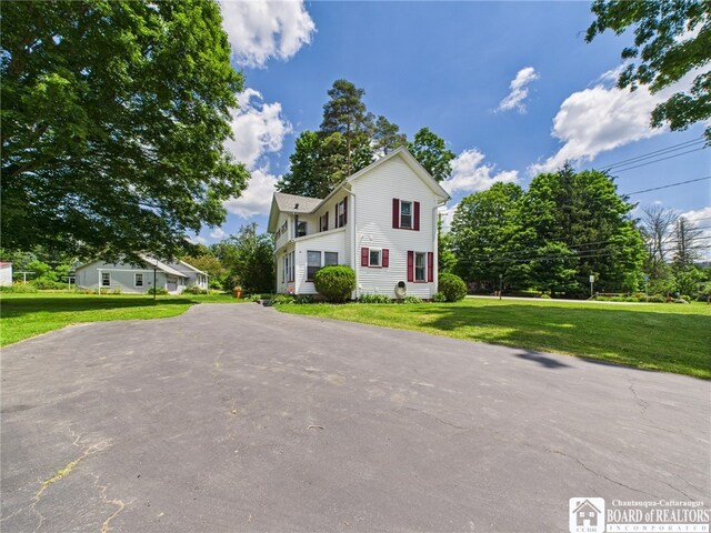 1683 Haskell Rd, Portville, NY 14760 - view of front of house with driveway and a front yard