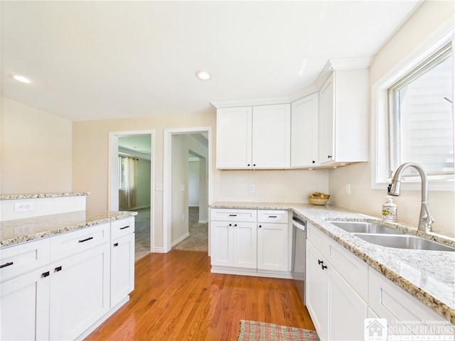 1683 Haskell Rd, Portville, NY 14760 - kitchen featuring light wood-style floors, white cabinetry, stainless steel dishwasher, recessed lighting, and light stone counters