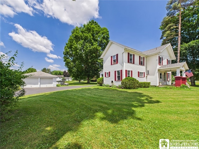 1683 Haskell Rd, Portville, NY 14760 - view of side of home featuring a detached garage and a lawn