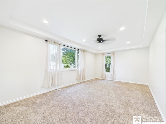 1683 Haskell Rd, Portville, NY 14760 - carpeted empty room with a tray ceiling, ceiling fan, and recessed lighting