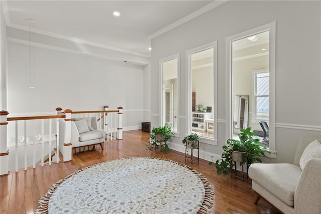 114-116 Main St Unit 114, Milo, NY 14527 - living area with crown molding, wood finished floors, an upstairs landing, and recessed lighting