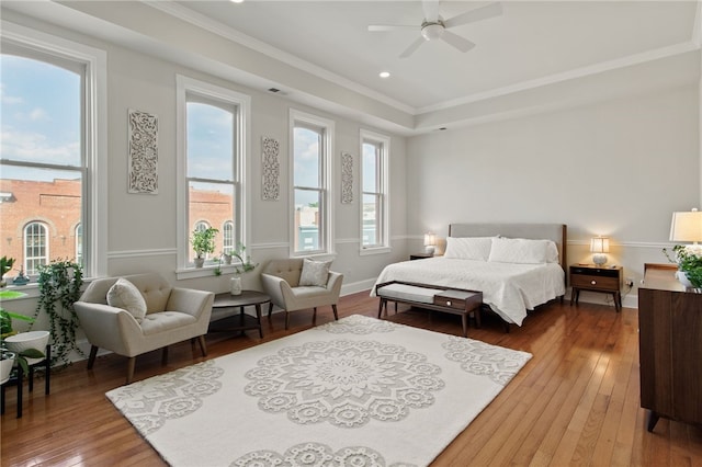114-116 Main St Unit 114, Milo, NY 14527 - bedroom with ornamental molding, hardwood / wood-style floors, multiple windows, a tray ceiling, and recessed lighting