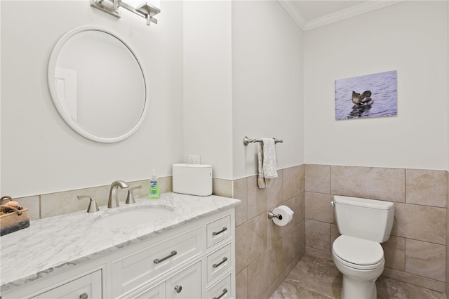 114-116 Main St Unit 114, Milo, NY 14527 - bathroom with crown molding, vanity, tile walls, and wainscoting
