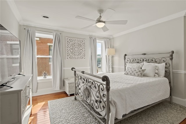 114-116 Main St Unit 114, Milo, NY 14527 - bedroom with crown molding, light wood finished floors, and a ceiling fan