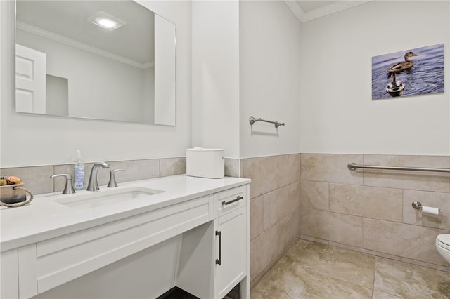 114-116 Main St Unit 114, Milo, NY 14527 - bathroom featuring ornamental molding, vanity, tile walls, and wainscoting